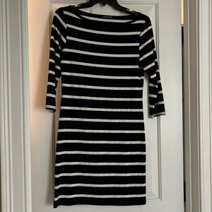 Soft and stretchy fitted knee length dress with 3/4 sleeves